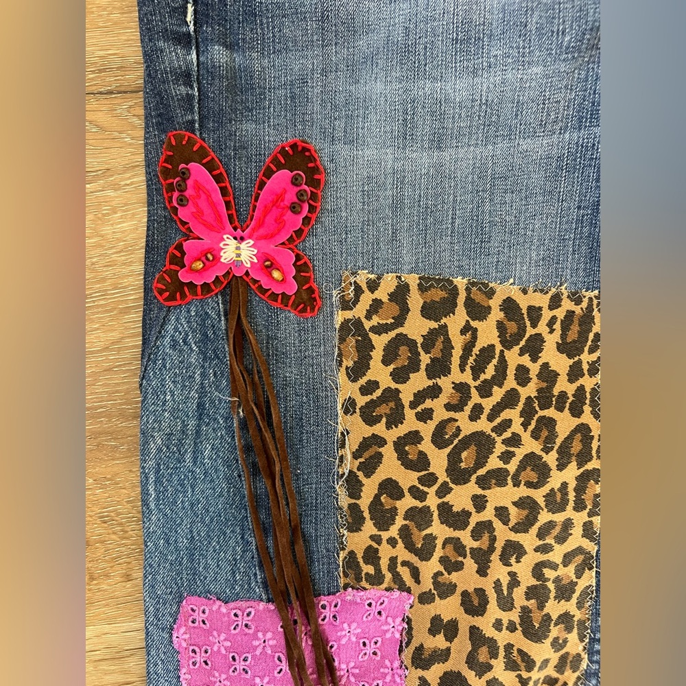 Upcycled wide leg mid rise jeans with patchwork and butterfly embellishments - Picture 3 of 9